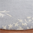 Safavieh Bella 5' Round Hand Tufted Wool Rug in Sand and Ivory