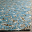 Safavieh Bella 4' X 6' Hand Tufted Wool Pile Rug in Blue and Taupe