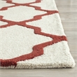 Safavieh Cambridge 5' X 8' Hand Tufted Wool Rug in Ivory and Rust