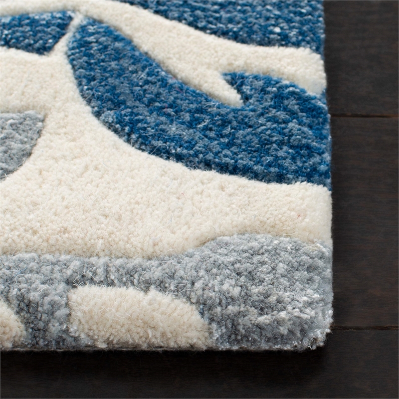 Safavieh Capri 5' X 8' Hand Tufted Wool Pile Rug in Ivory and Blue