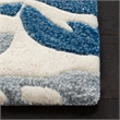 Safavieh Capri 5' X 8' Hand Tufted Wool Pile Rug in Ivory and Blue