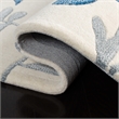 Safavieh Capri 5' X 8' Hand Tufted Wool Pile Rug in Ivory and Blue
