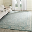 Safavieh Evoke 9' X 12' Power Loomed Rug in Ivory and Light Blue