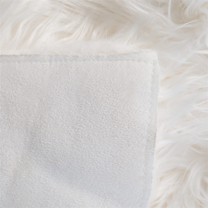 Safavieh Faux Sheep Skin 5' X 7' Power Loomed Acrylic Rug in Ivory