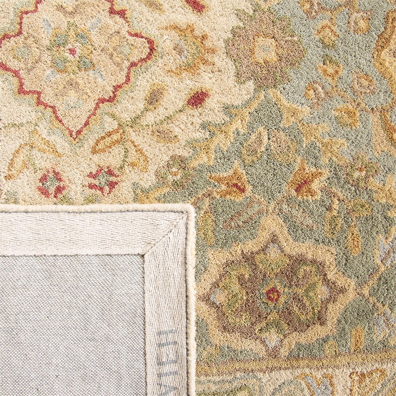 Safavieh Heritage 5' X 8' Hand Tufted Wool Pile Rug in and Ivory