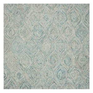 Safavieh Ikat 4' Round Hand Tufted Wool Rug in Ivory and Sea Blue