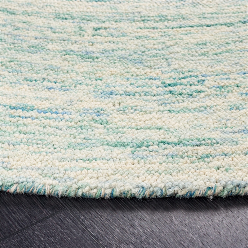 Safavieh Ikat 8' Round Hand Tufted Wool Rug in Ivory and Blue