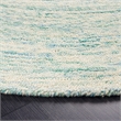 Safavieh Ikat 8' Round Hand Tufted Wool Rug in Ivory and Blue