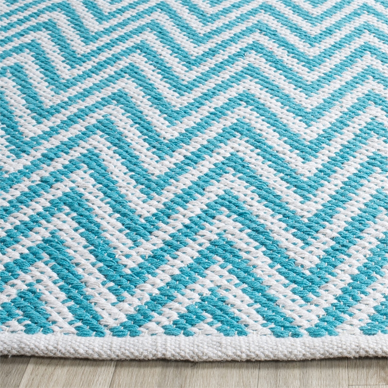 Safavieh Montauk 5' X 7' Hand Woven Cotton Rug in Turquoise and Ivory