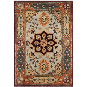 Safavieh Legend 6' X 9' Hand Tufted Wool Rug in Red and Rust