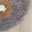Safavieh Shag 8' Round Hand Tufted Acrylic Rug in Ivory