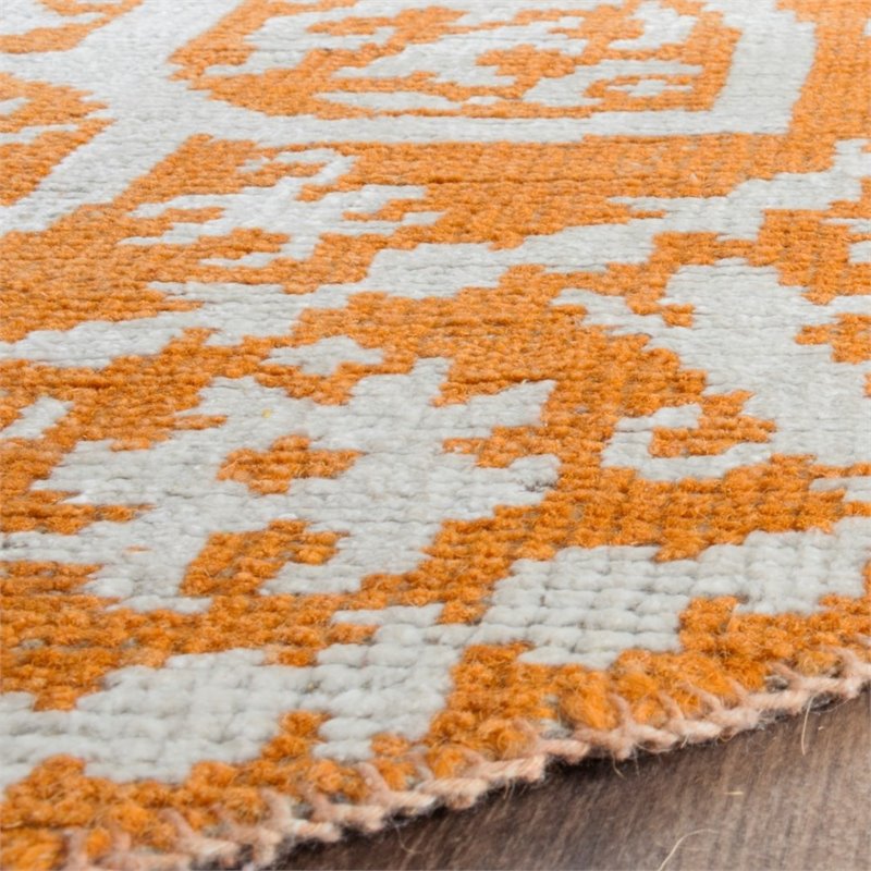 Safavieh Stone Wash 6' Round Hand Knotted Rug in Copper