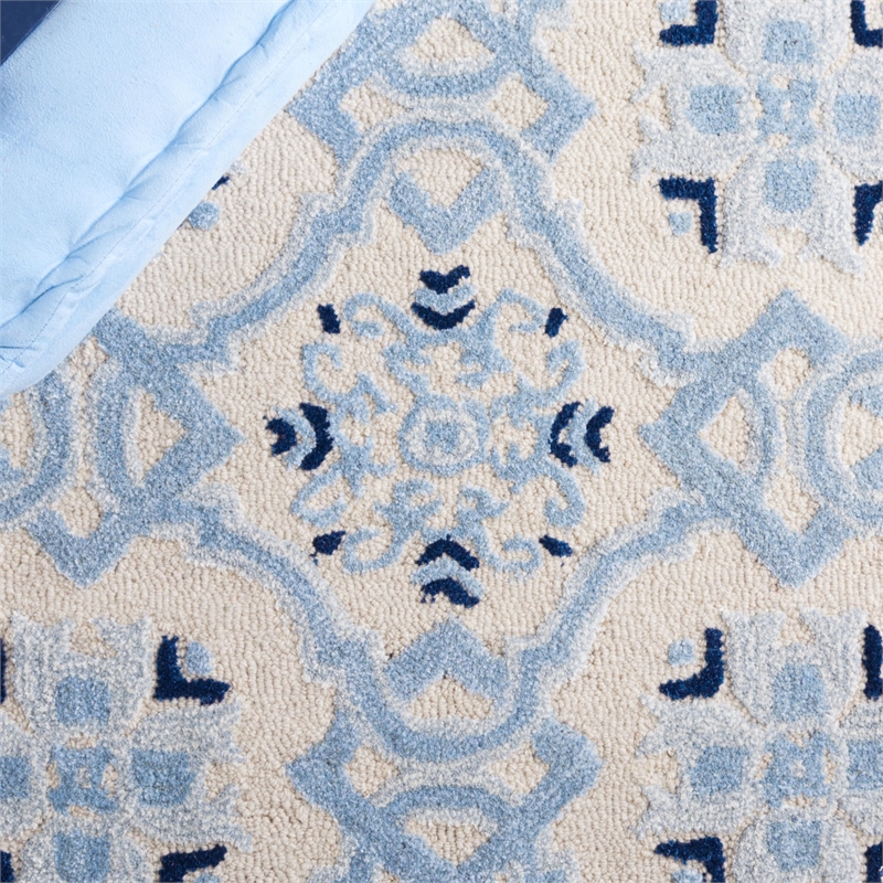 Safavieh Bella 6' X 9' Hand Tufted Rug in Ivory and Blue