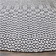 Safavieh Montauk 6' X 6' Round Hand Woven Cotton Rug in Ivory and Navy