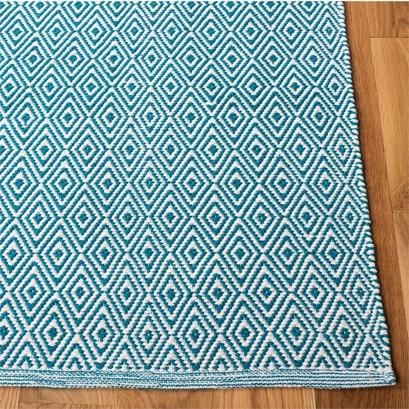 Safavieh Montauk 5' X 8' Hand Woven Cotton Rug in Ivory and Turquoise