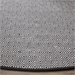 Safavieh Montauk 4' X 4' Round Hand Woven Cotton Rug in Ivory and Navy