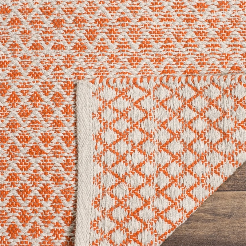 Safavieh Montauk 5' X 8' Hand Woven Cotton Rug in Orange and Ivory