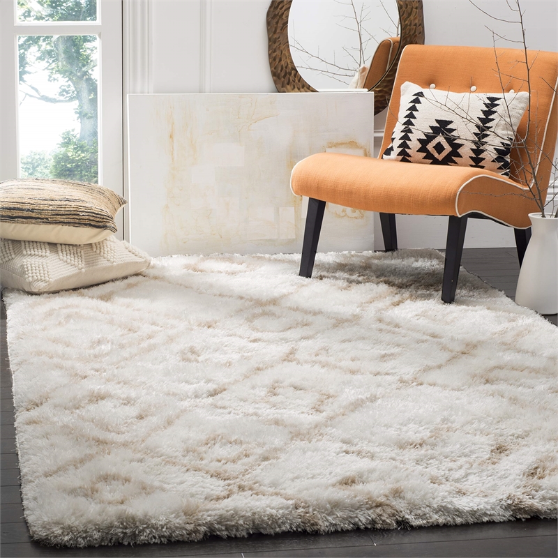 Safavieh Toronto Shag 5' X 8' Hand Tufted Rug in Ivory and Beige