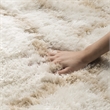 Safavieh Toronto Shag 5' X 8' Hand Tufted Rug in Ivory and Beige
