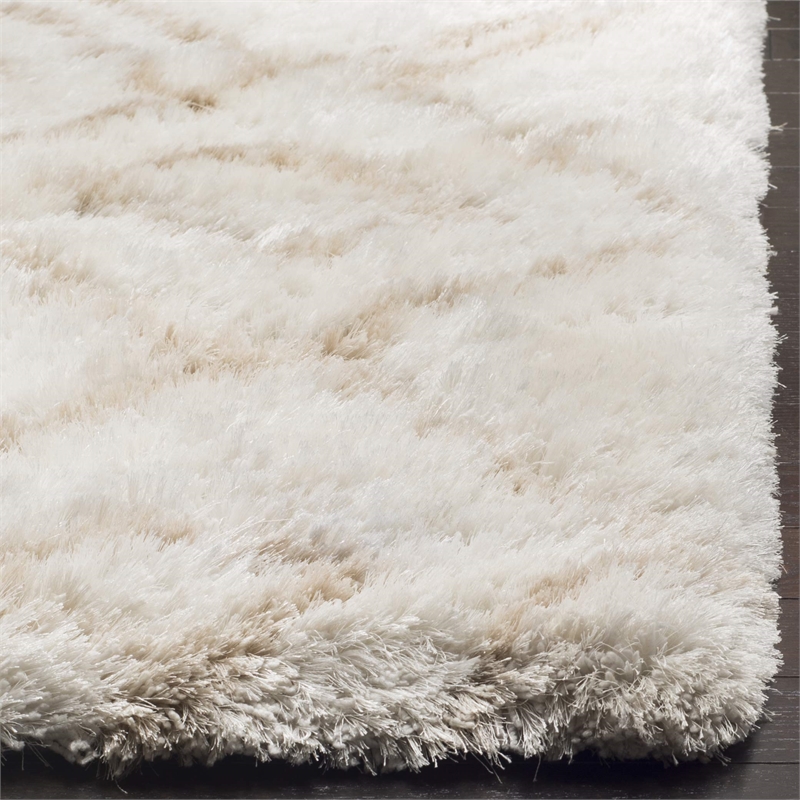 Safavieh Toronto Shag 5' X 8' Hand Tufted Rug in Ivory and Beige