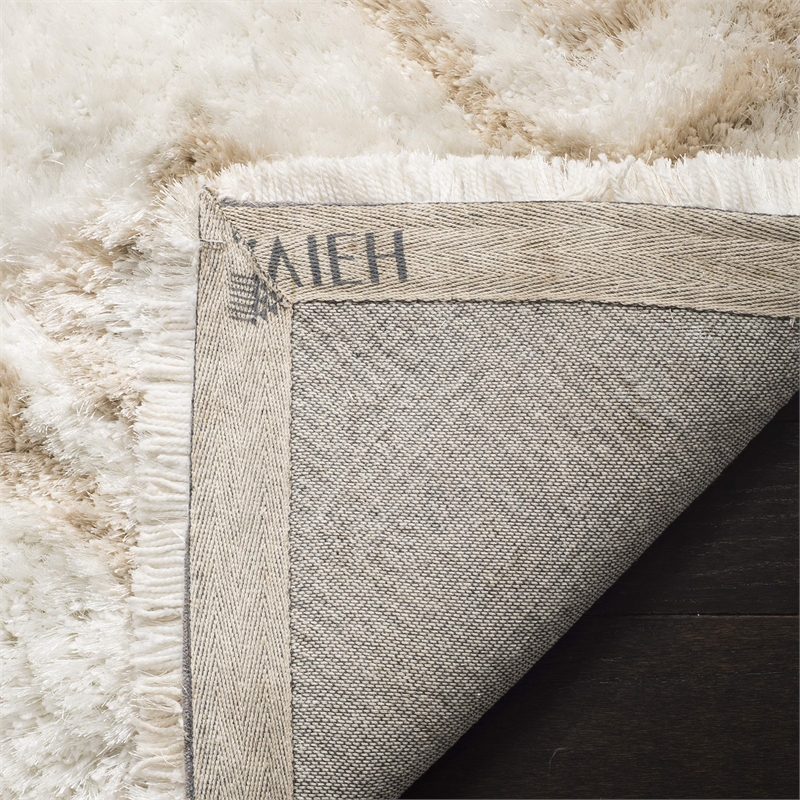 Safavieh Toronto Shag 5' X 8' Hand Tufted Rug in Ivory and Beige