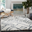 Safavieh Toronto Shag 8' X 10' Hand Tufted Rug in Ivory and Beige