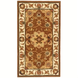 Safavieh Traditions 6' X 9' Hand Tufted Wool Rug in Tan and Ivory