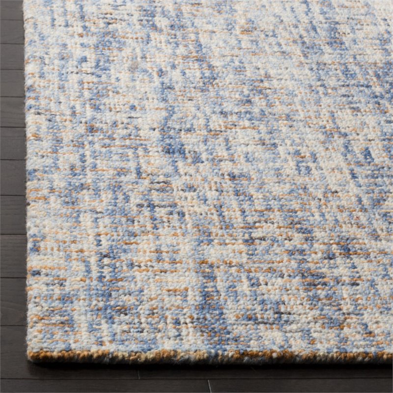 Safavieh Abstract 8' x 10' Hand Tufted Wool Rug in Dark Blue and Rust