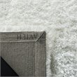 Safavieh Toronto 4' x 6' Hand Tufted Shag Rug in Ivory