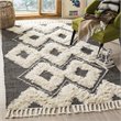 Safavieh Kenya 3' x 5' Hand Knotted Wool Rug in Black and Ivory