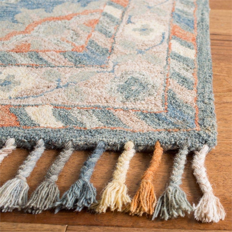 Safavieh Aspen 9' x 12' Hand Tufted Wool Rug in Blue and Rust