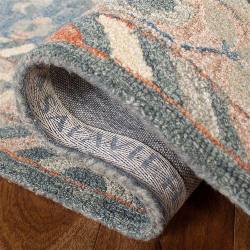 Safavieh Aspen 9' x 12' Hand Tufted Wool Rug in Blue and Rust