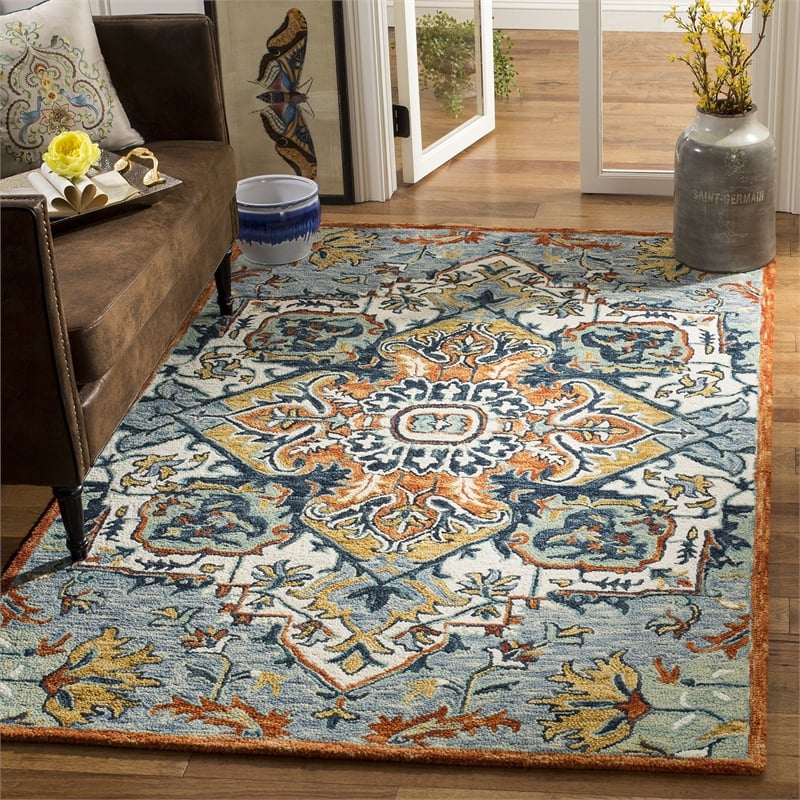 Safavieh Aspen 6' x 9' Hand Tufted Wool Rug in Blue and Rust