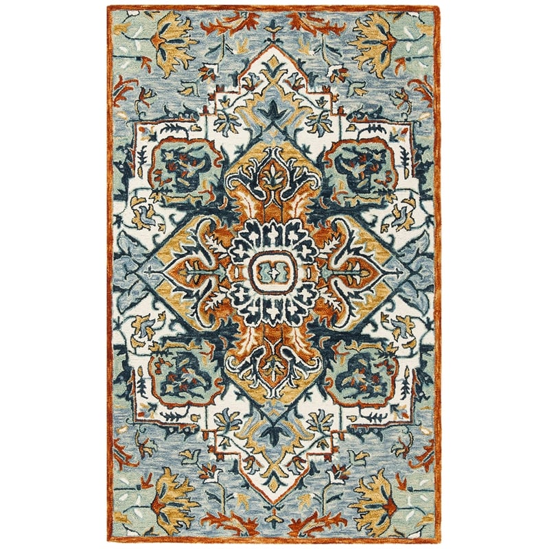 Safavieh Aspen 6' x 9' Hand Tufted Wool Rug in Blue and Rust