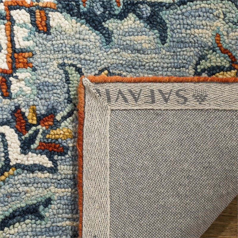Safavieh Aspen 6' x 9' Hand Tufted Wool Rug in Blue and Rust