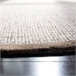 Safavieh Abstract 6' Round Hand Tufted Wool Rug in Brown and Ivory