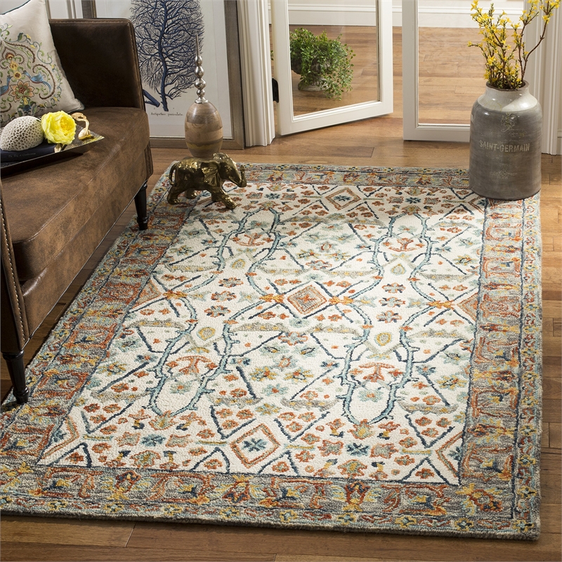 Safavieh Aspen 6' x 9' Hand Tufted Wool Rug in Ivory and Blue