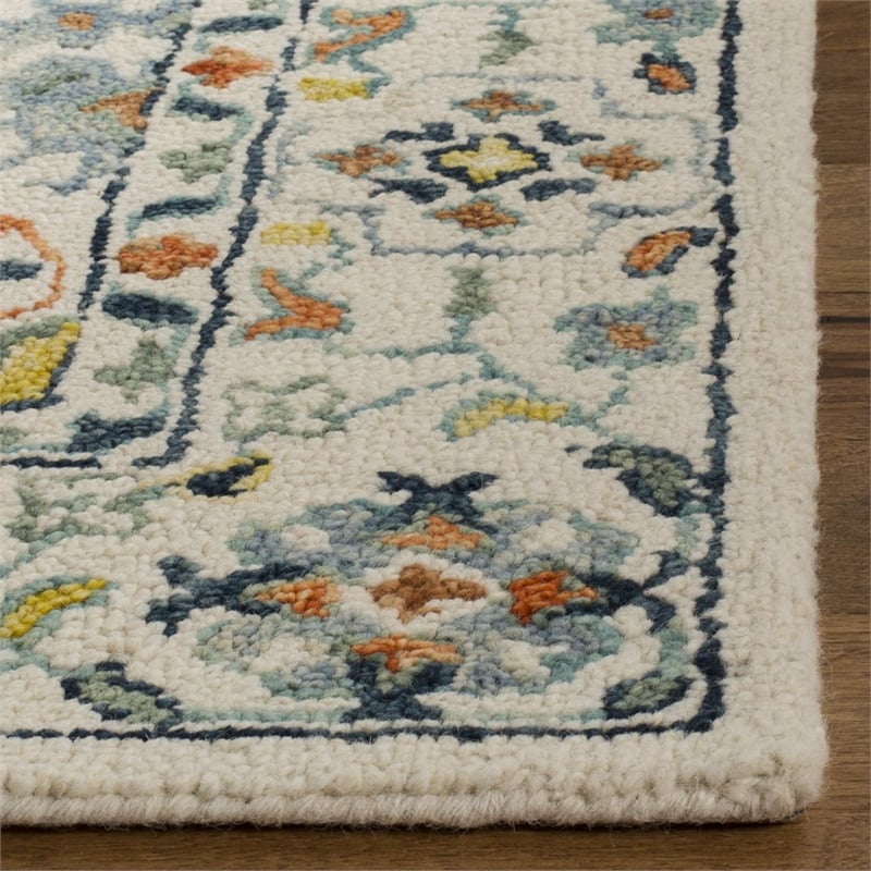 Safavieh Aspen 10' x 14' Hand Tufted Wool Rug in Ivory and Blue