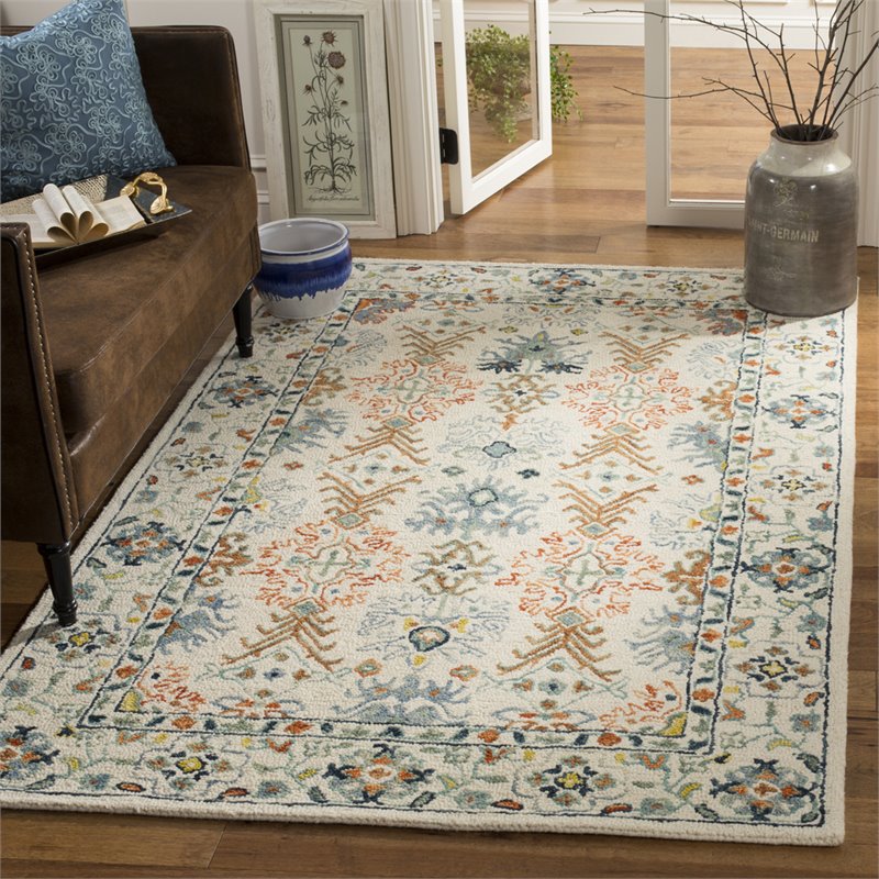 Safavieh Aspen 6' x 9' Hand Tufted Wool Rug in Ivory and Blue