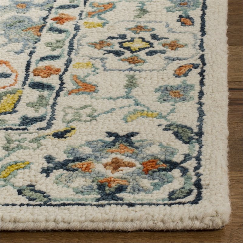 Safavieh Aspen 6' x 9' Hand Tufted Wool Rug in Ivory and Blue