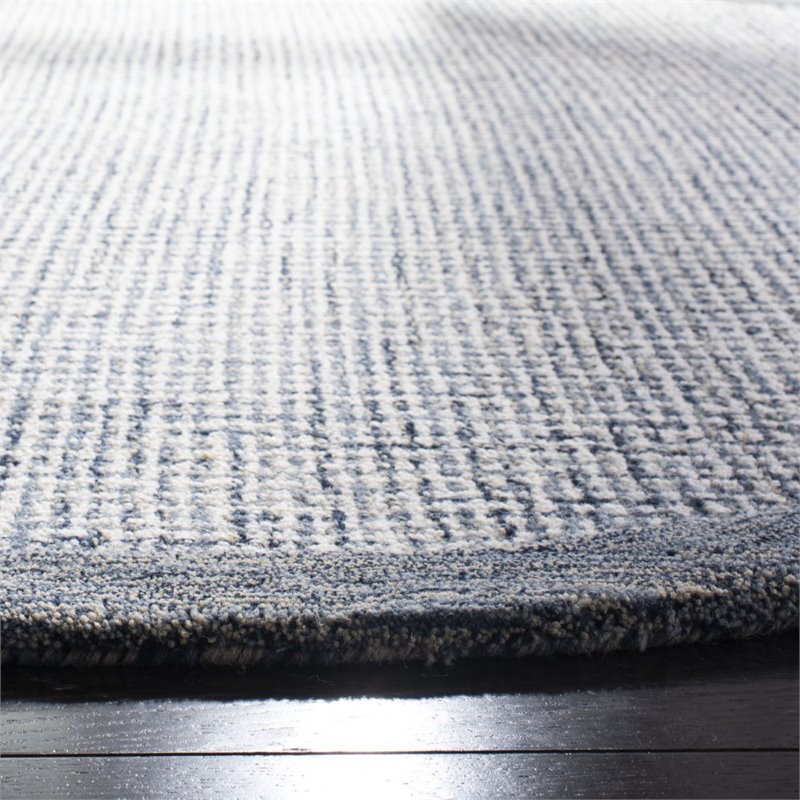 Safavieh Abstract 6' Round Hand Tufted Wool Rug in Navy and Ivory