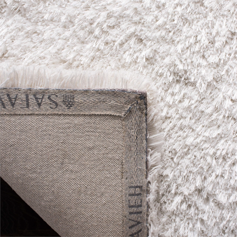 Safavieh Atlantic 5' x 8' Hand Tufted Shag Rug in Ivory