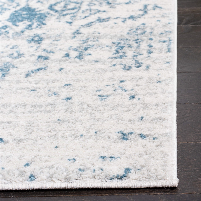 Safavieh Madison 4' x 6' Rug in Teal and Ivory