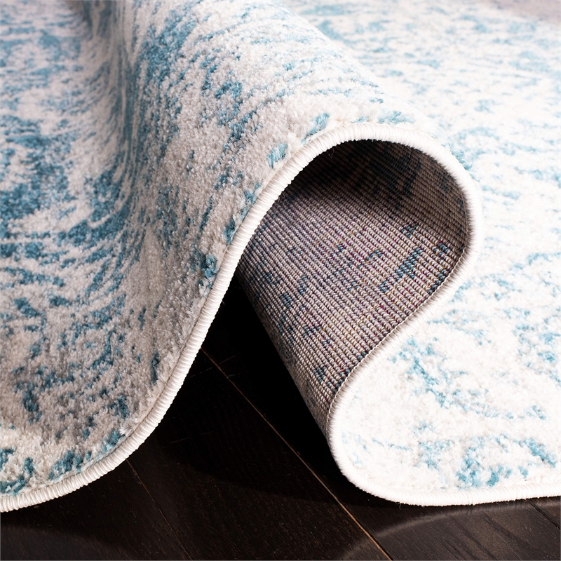 Safavieh Madison 4' x 6' Rug in Teal and Ivory