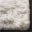 Safavieh Ocean 5' x 8' Hand Tufted Shag Rug in Ivory