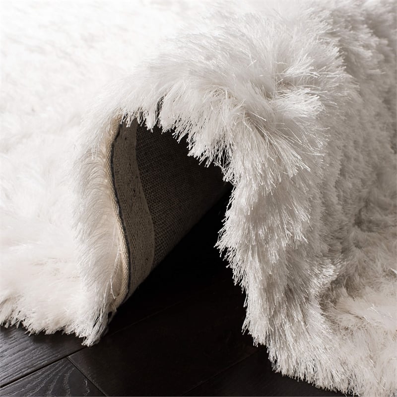 Safavieh Ocean 5' x 8' Hand Tufted Shag Rug in Ivory