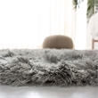 Safavieh Ocean 5' x 8' Hand Tufted Shag Rug in Silver