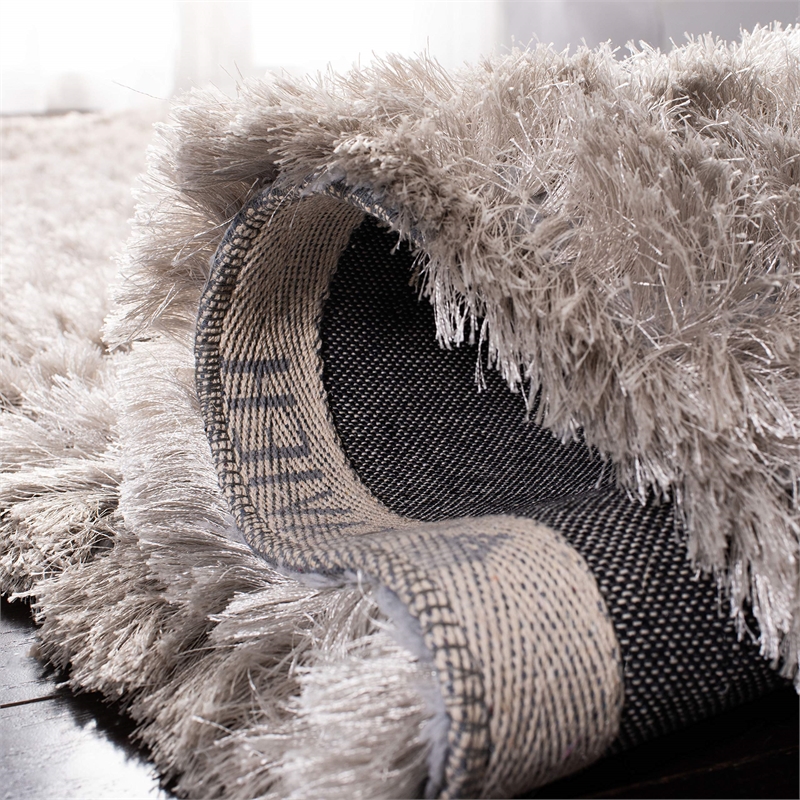Safavieh Riviera 4' x 6' Hand Tufted Shag Rug in Beige