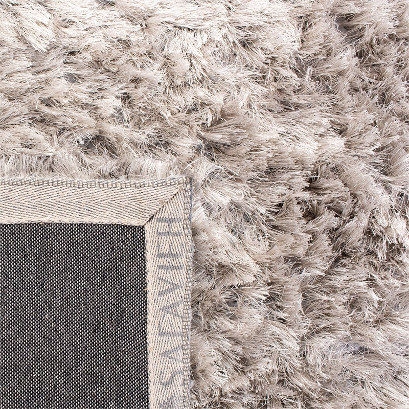 Safavieh Riviera 5' x 8' Hand Tufted Shag Rug in Beige