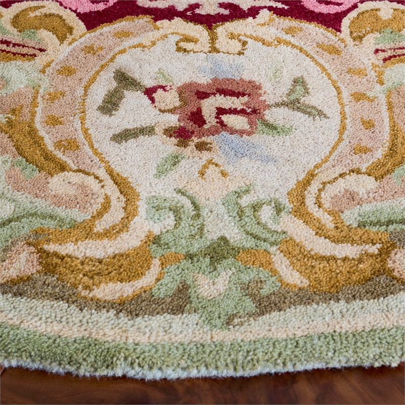 Safavieh Savonnerie 6' Round Hand Tufted Wool Rug in Red and Ivory